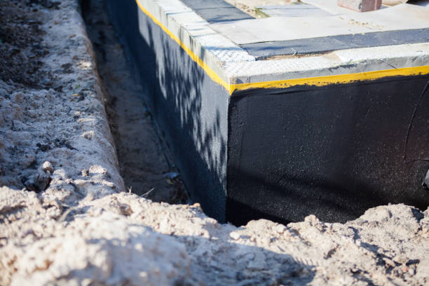 Professional Interior Drainage System technician working in Folsom, NJ